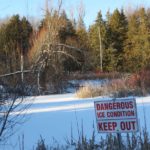 Forest Pond Danger Sign
