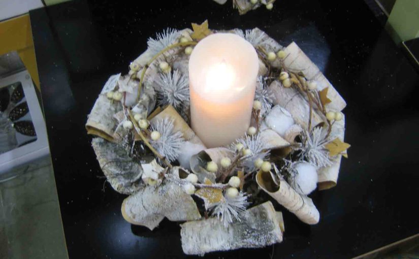 Candle decoration center piece using the bark from the white birch tree.